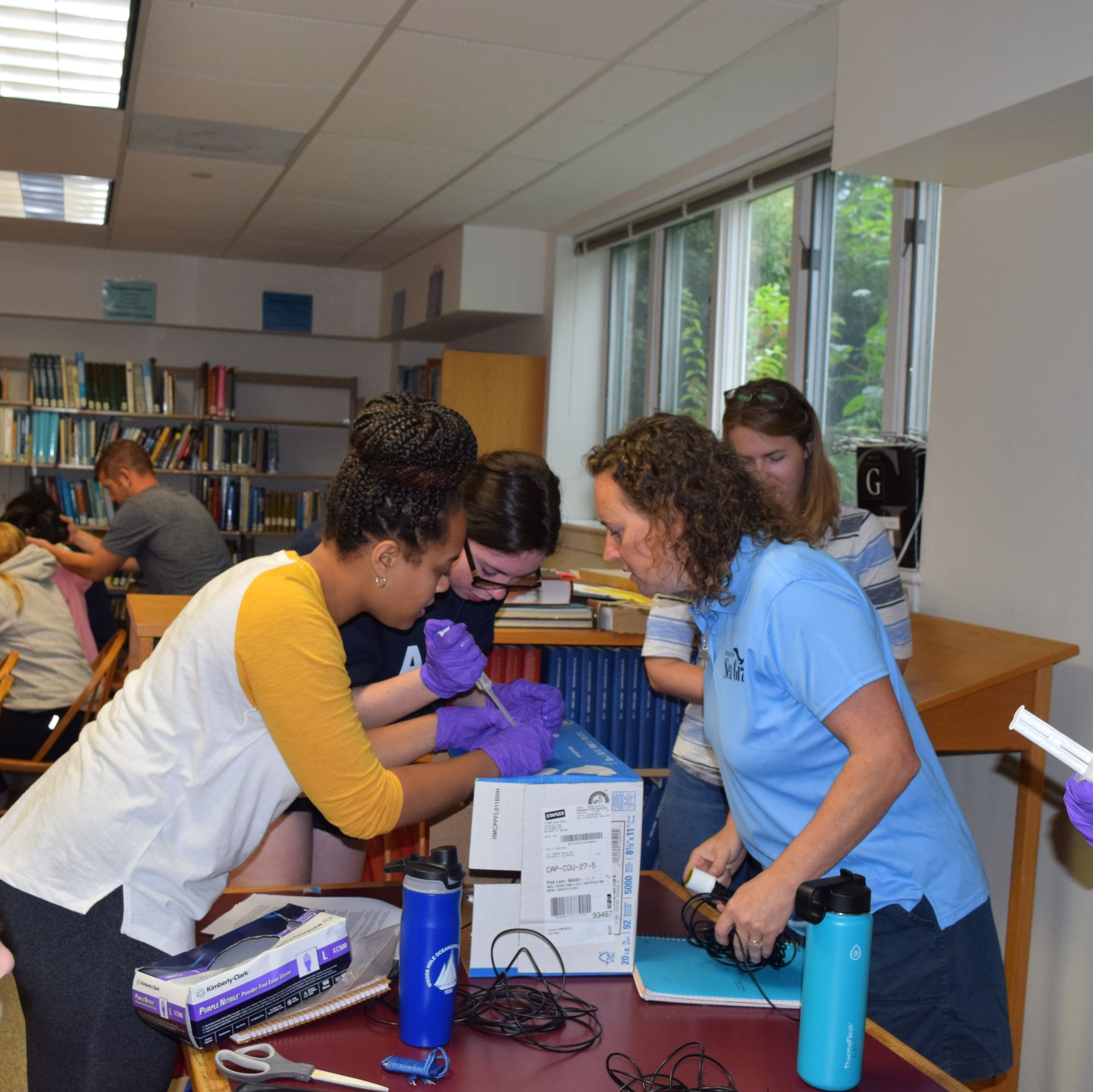 Girls in Science fellows working in the lab