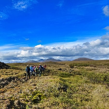 A group of people hiking in Canada's MacKenzie Mountains.