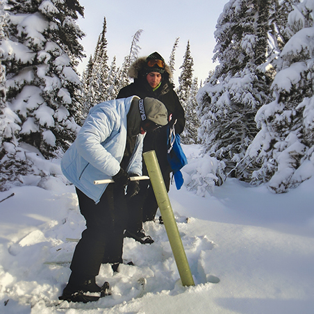 Two men taking environmental samples from the snow (C) Elaine Spence | Earthwatch.