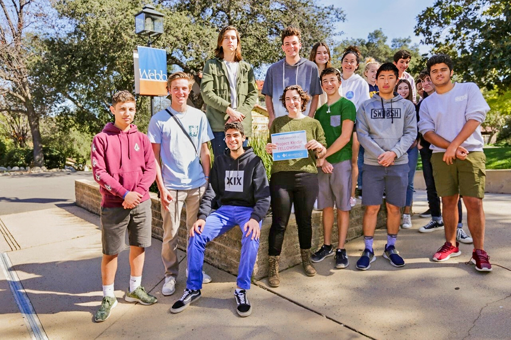 Group of students and teacher posing for a photo